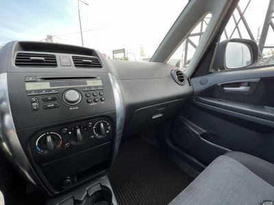 SUZUKI SX4 Sedan 1.6 GLX AC Ülésfűtés Multikormány Klíma Bordómetál!